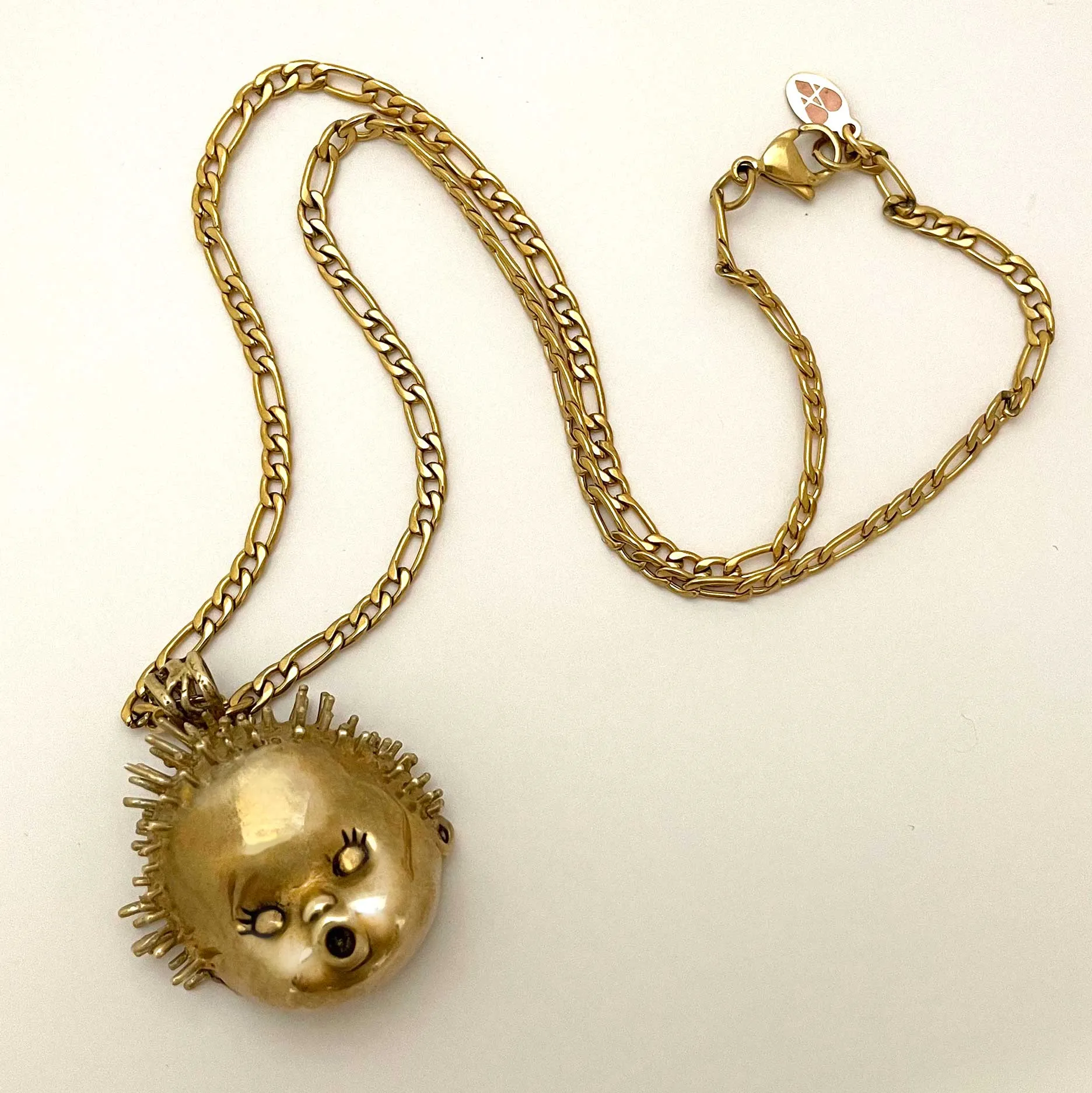 Baby Doll Head Haircut Mishap Necklace