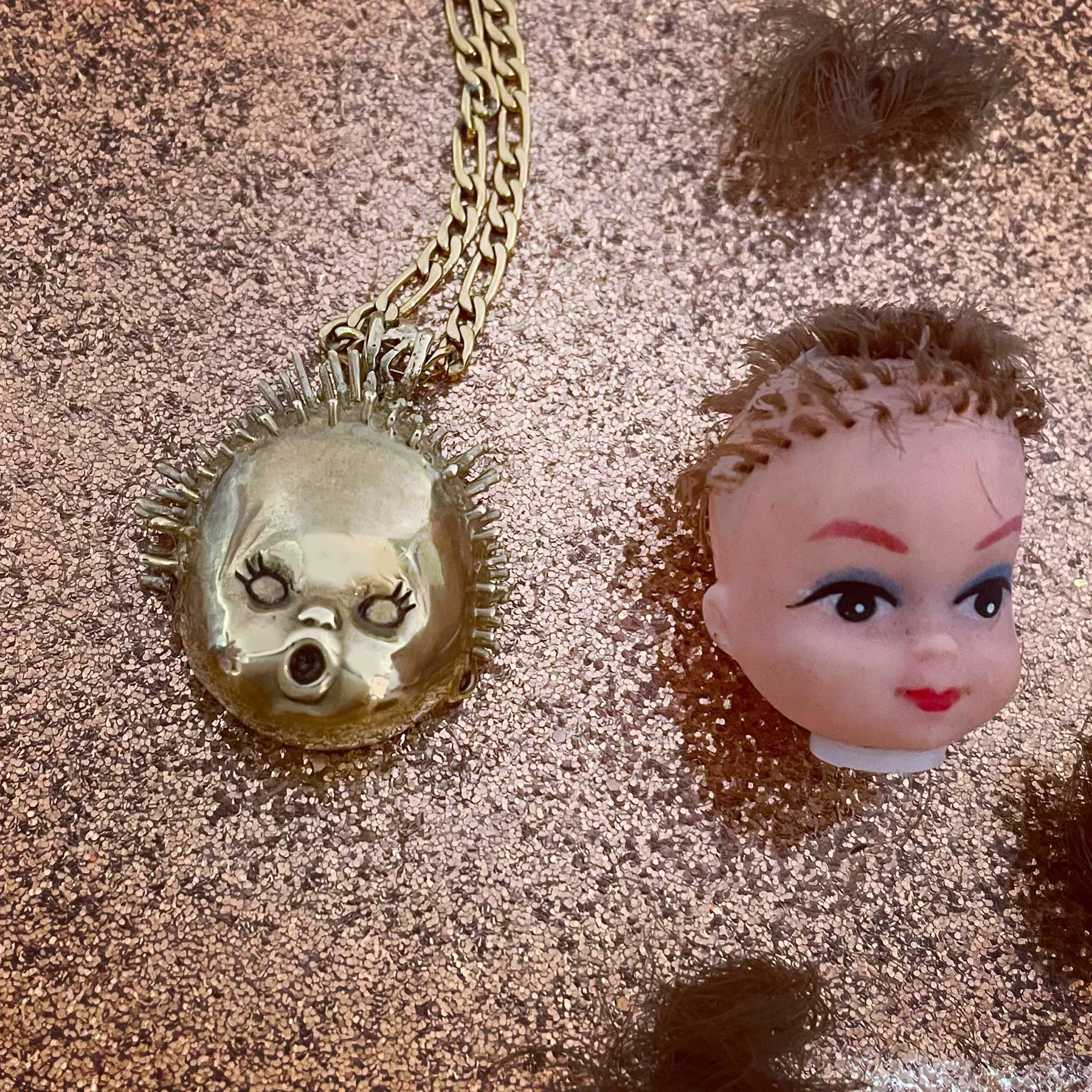 Baby Doll Head Haircut Mishap Necklace