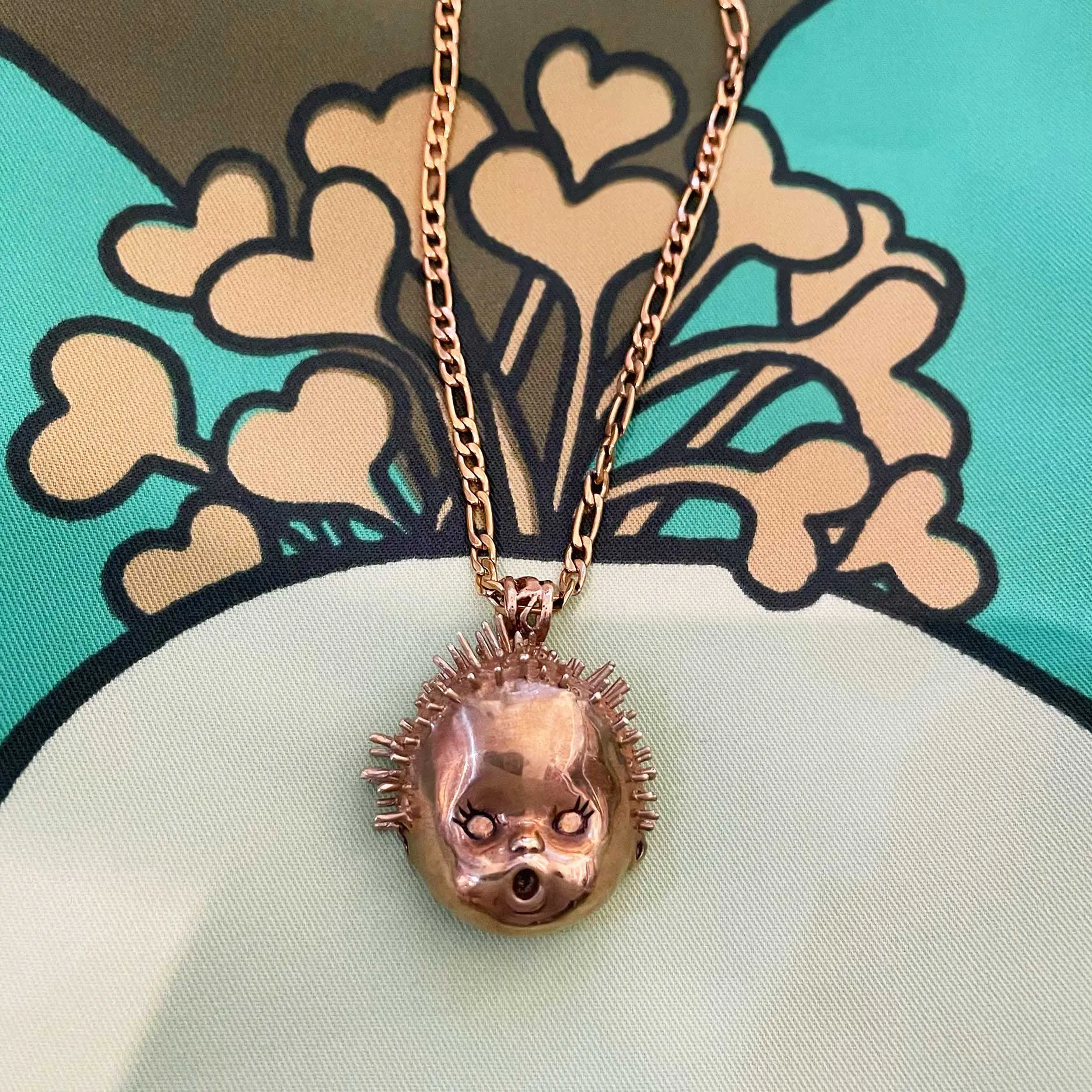 Baby Doll Head Haircut Mishap Necklace