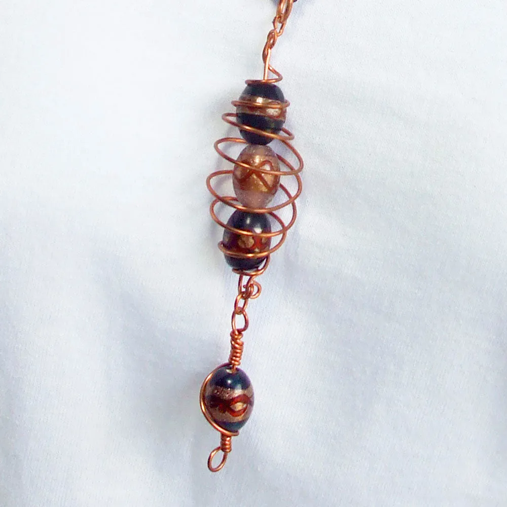 Haviva, Copper Wire Cage Holding Blown Glass Beads, Pendant, Necklace