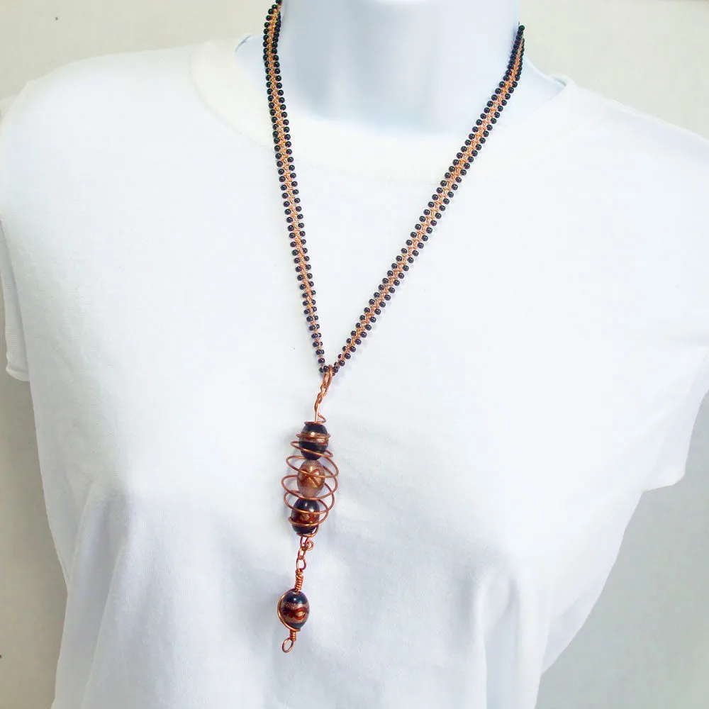 Haviva, Copper Wire Cage Holding Blown Glass Beads, Pendant, Necklace