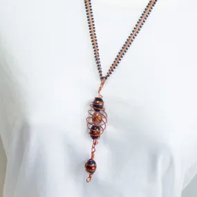 Haviva, Copper Wire Cage Holding Blown Glass Beads, Pendant, Necklace