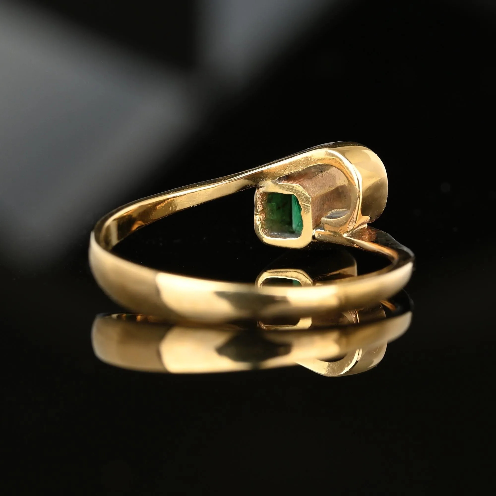 Modernist 18K Gold Bypass Solitaire Emerald Ring