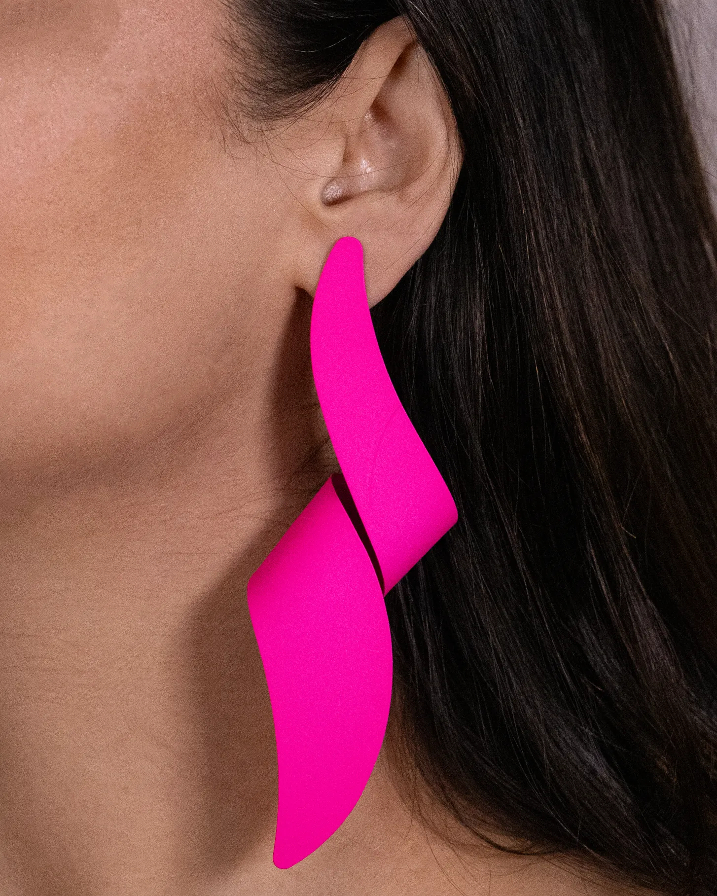 Pink long twisted dangler earrings